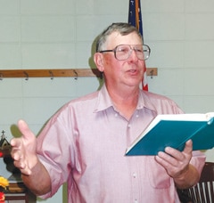 Thelbert Gott leads worship during a Sunday worship service at Union Mound Baptist Church. A charter member of the church, Gott is a deacon and leads evening Bible study. He and his wife, Lorene, keep the grounds and the adjacent cemetery looking good. (Brian Kaylor)