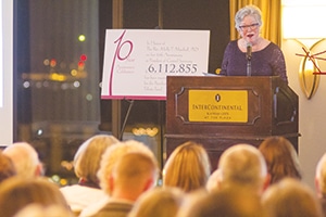 Molly Marshall responds to various expressions of appreciation at a Nov. 12 event in Kansas City, Mo., celebrating her 10th an-niversary at the helm of Central Baptist Theological Seminary in Shawnee, Kan. (Francisco Litardo)