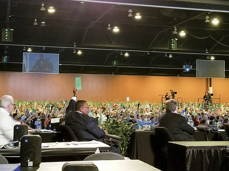 Messengers raise their ballots to approve a request by the Resolutions Committee to present a resolution on "anti-Gospel alt-right white supremacy" at the Southern Baptist Convention annual meeting at the Phoenix Convention Center. Photo courtesy of Philip Bethancourt