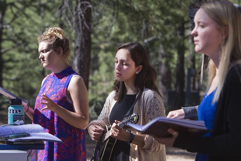 From left, Meleeza Hall, Gabi Sheeley and Amy Auble sing worship songs in Bryce Canyon National Park on June 18, 2017. Photo courtesy of Deseret News/Kelsey Brunner