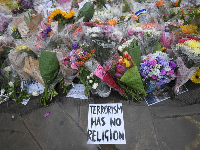 Floral tributes near the scene of the recent attack at London Bridge and Borough Market, in central London, on June 6, 2017. Photo courtesy of Reuters/Toby Melville