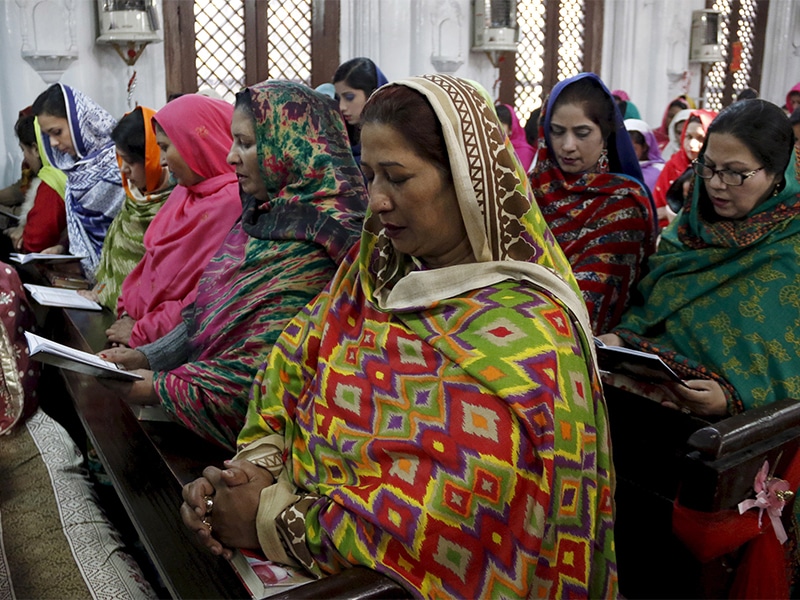 Christian women worship together at a Mass at All Saints Church in Peshawar, Pakistan, on Dec. 25, 2015. Photo courtesy of Reuters/Khuram Parvez