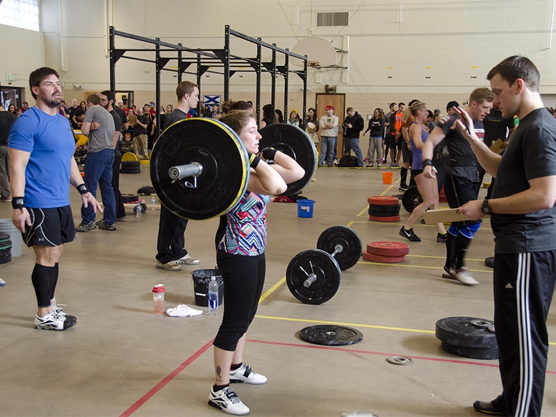 A woman awaits a judge during a CrossFit event in 2013. Photo courtesy of James Holroyd/Creative Commons
