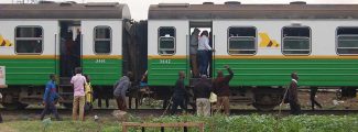 A section of coaches of a Kenyan train that takes commuters between Ruiru and Nairobi City, shown at Mutindwa crossing point in east Nairobi on Sept. 28, 2017. The train is seeing increased religious activity. Photo by Fredrick Nzwili