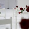 A memorial for the victims of the shooting at Sutherland Springs First Baptist Church, including 26 white chairs each painted with a cross and and rose, is displayed in the church Sunday, Nov. 12, 2017, in Sutherland Springs, Texas. A man opened fire inside the church in the small South Texas community last week, killing more than two dozen. (AP Photo/Eric Gay)