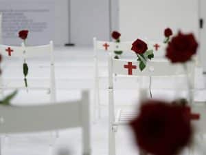 A memorial for the victims of the shooting at Sutherland Springs First Baptist Church, including 26 white chairs each painted with a cross and and rose, is displayed in the church Sunday, Nov. 12, 2017, in Sutherland Springs, Texas. A man opened fire inside the church in the small South Texas community last week, killing more than two dozen. (AP Photo/Eric Gay)