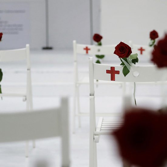 A memorial for the victims of the shooting at Sutherland Springs First Baptist Church, including 26 white chairs each painted with a cross and and rose, is displayed in the church Sunday, Nov. 12, 2017, in Sutherland Springs, Texas. A man opened fire inside the church in the small South Texas community last week, killing more than two dozen. (AP Photo/Eric Gay)