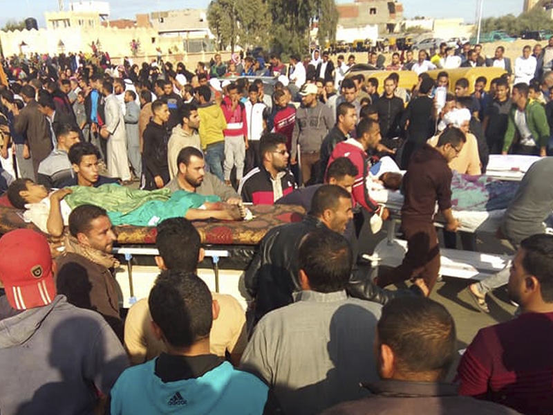 Injured people are evacuated from the scene of a militant attack on a mosque in Bir al-Abd in the northern Sinai Peninsula of Egypt on Friday, Nov. 24, 2017. In the deadliest-ever attack by Islamic extremists in Egypt, militants assaulted a crowded mosque Friday during prayers, blasting helpless worshippers with gunfire and rocket-propelled grenades and blocking their escape routes. More than 200 people were killed before the assailants got away. (AP Photo)
