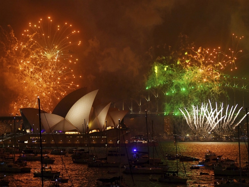 Fireworks explode over Sydney Harbor during New Year’s Eve celebrations in Sydney, Australia, Sunday, Dec. 31, 2017. (David Moir/AAP Image via AP)