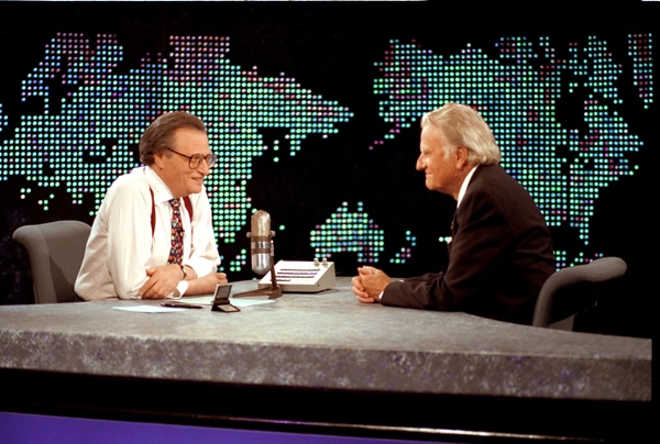 Billy Graham (right) during an interview on CNN’s “Larry King Live” in 1994. RNS photo courtesy of the Billy Graham Evangelistic Association.