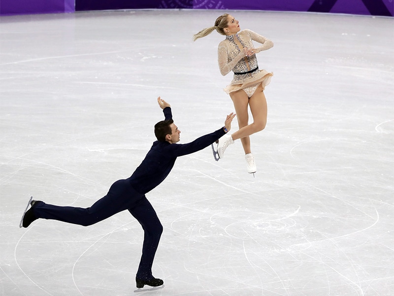 Chris Knierim, left, and Alexa Scimeca Knierim, of Team USA, perform in the pair skating short program team event at the 2018 Winter Olympics in Gangneung, South Korea, on Feb. 9, 2018. (AP Photo/Julie Jacobson)