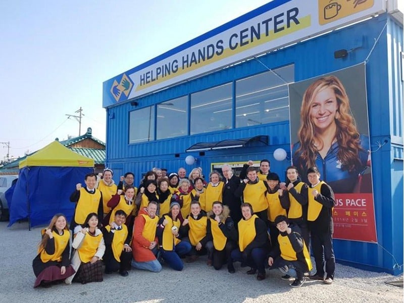 Missionaries and volunteers gather outside the Mormon Helping Hands Center in Gangneung, South Korea. Photo courtesy of Helping Hands Center