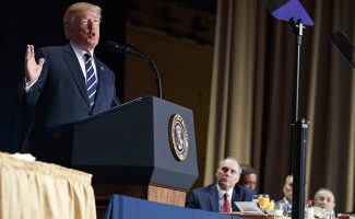 President Trump speaks during the National Prayer Breakfast, Thursday, Feb. 8, 2018, in Washington, with Steve Scalise at right. (AP Photo: Evan Vucci)