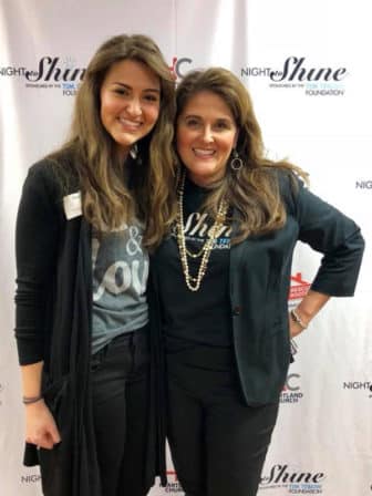 Ginger Moore, right, and her daughter Georgia Leigh Moore, pose at a “Night to Shine” event at Heartland Church in Paducah, Ky., on Feb. 9, 2018. The Moores pinned boutonnieres on the special-needs “kings” who participated in the prom-night experience for teens and adults with special needs. Photo courtesy of Ginger Moore