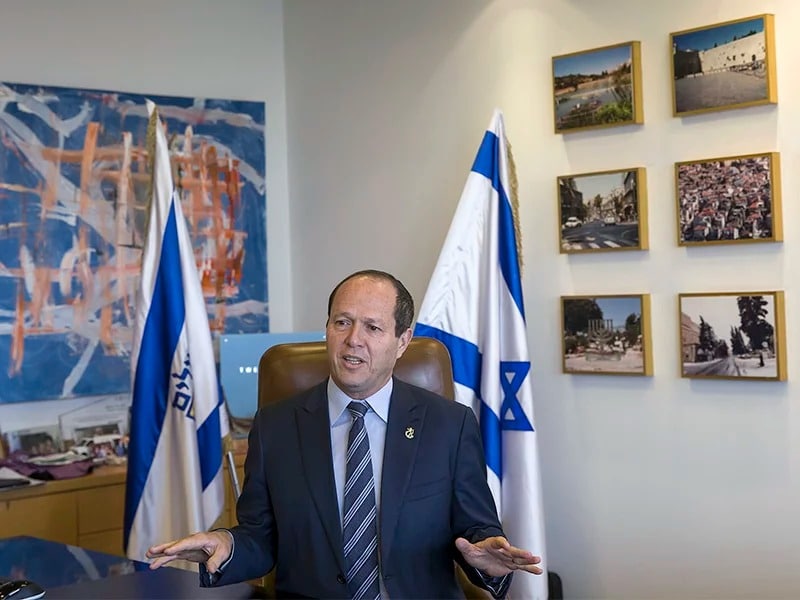 Jerusalem Mayor Nir Barkat speaks in Jerusalem on Feb. 27, 2018. Barkat said that he was working with a third party to resolve a tax dispute with major Christian denominations that led to the closure of the Church of the Holy Sepulchre, one of Christianity’s holiest sites, just ahead of the busy Easter season. The mayor later suspended plans to collect taxes from churches. (AP Photo/Tsafrir Abayov)
