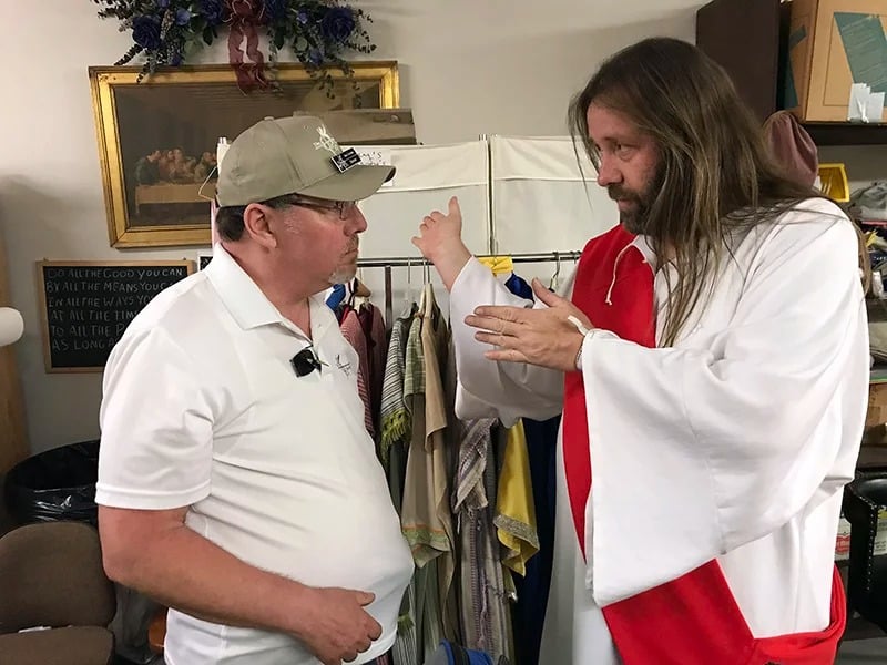 Alan Corrales, director of the “Prince of Peace” Easter pageant at Holy City of the Wichitas in southwestern Oklahoma, talks to Jorg Kidd, one of the actors who portrays Jesus, on March 24, 2018. RNS photo by Bobby Ross Jr.