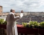 Pope Francis delivers the Urbi et Orbi (to the city and to the world) blessing at the end of the Easter Sunday Mass in St. Peter's Square at the Vatican, Sunday, April 1, 2018. (Vatican Media via AP)