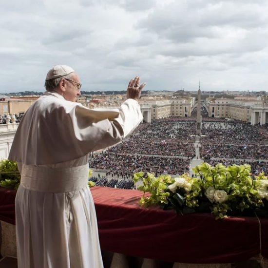 Pope Francis delivers the Urbi et Orbi (to the city and to the world) blessing at the end of the Easter Sunday Mass in St. Peter's Square at the Vatican, Sunday, April 1, 2018. (Vatican Media via AP)