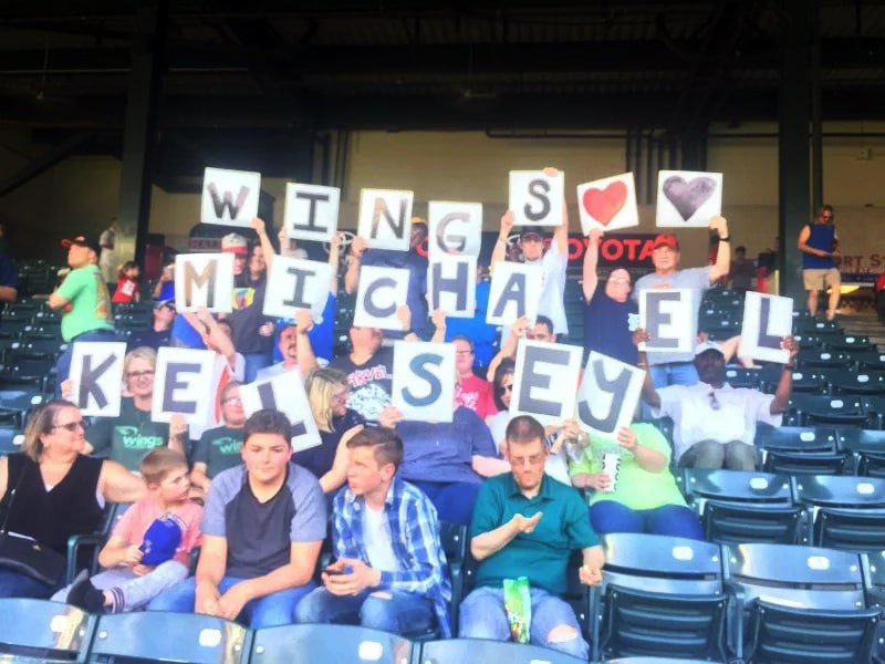 Members of Wings, a Christian nonprofit that offers social, vocational and residential programs for adults with developmental disabilities, show their appreciation for Detroit Tigers pitcher Michael Fulmer and his wife, Kelsey. The group from Wings, based in Edmond, Okla., came to see Fulmer pitch at Globe Life Park in Arlington, Texas, on May 7, 2018. Photo provided by Randy Webb