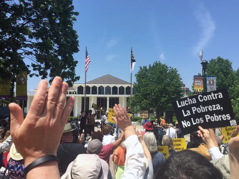 People participate in a Poor People’s Campaign event in Raleigh, N.C., on May 14, 2018 in front of the state legislature building. Coordinated events took occurred at many state capitols across the country. RNS photo by Yonat Shimron