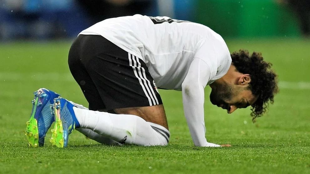 Egypt's Mohamed Salah prays on the ground after scoring a penalty during the group A match between Russia and Egypt at the 2018 soccer World Cup in the St. Petersburg stadium in St. Petersburg, Russia, Tuesday, June 19, 2018. (AP Photo/Martin Meissner)