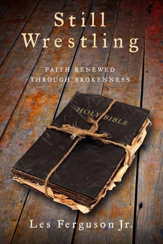 “Still Wrestling: Faith Renewed Through Brokenness” by Les Ferguson Jr. explores questions of faith and doubt that consumed the Mississippi minister after his wife and disabled son were slain in 2011. Image courtesy of Leafwood Publishers