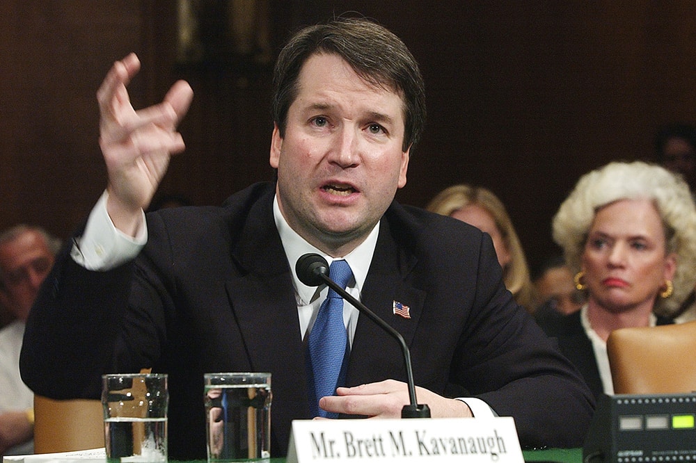 Brett Kavanaugh appears before the Senate Judiciary Committee on Capitol Hill in Washington on April 26, 2004.  (AP Photo/Dennis Cook)