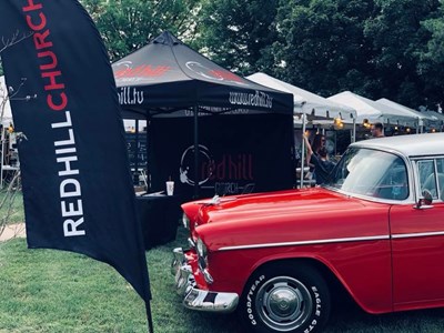 Showcased just outside Red Hill Church's two tents at the Route 66 festival is a 1955 Chevy Bel Air. The gleaming red and white car attracted visitors to the church's display. Submitted photo