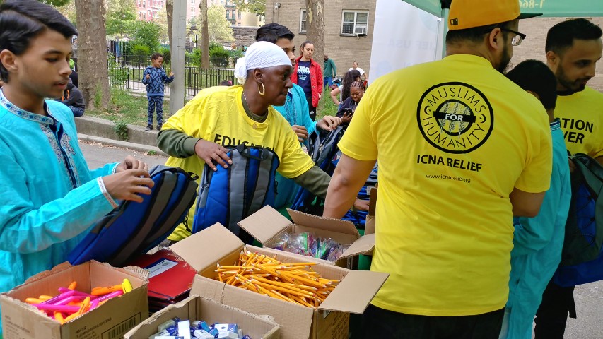 Volunteers organize supplies during an event with the Islamic Circle of North America's back-to-school drive in Hempstead, N.Y., on Sept. 2, 2017. Photo courtesy Shahid Farooqi