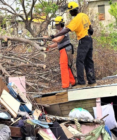 Send Relief volunteers trained in Southern Baptist Disaster Relief remove debris that is still prevalent in Puerto Rico a year after Hurricane Maria struck. Send Relief photo