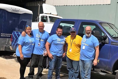 Jonathan Santiago (in yellow shirt), is coordinator of the North American Mission Board Send Relief Ministry Center in Guaynabo, Puerto Rico . Send Relief photo