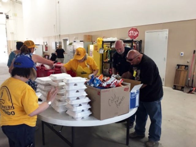Southern Baptist Disaster Relief volunteers prepare meals for those affected by wildfires in southern Colorado in July 2018. Residents and first responders were served. Photo by Dennis Belz via Baptist Press