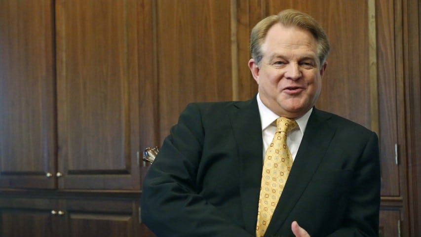 In this April 2, 2018, file photo, Gordon Robertson, CEO of Christian Broadcasting Network and son of CBN founder Pat Robertson, speaks during an interview at CBN headquarters in Virginia Beach, Va. The conservative Christian TV network is entering the crowded world of 24-hour news broadcasting at a time when the mainstream news media are under increasing attack by President Trump and his supporters, many of them evangelicals. The Christian Broadcasting Network's news channel will provide a religious perspective that other channels lack, Gordon Robertson told The Associated Press in an interview in advance of the network's formal launch on Oct. 1. (AP Photo/Steve Helber, File)