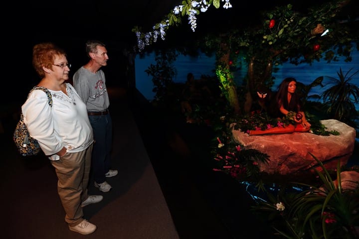 Ann Nelson and her husband Tim, of Hilliard, Ohio, view the Adam and Eve display during a tour at BibleWalk, in Mansfield, Ohio, on Sept. 28, 2018. RNS photo by Paul Vernon