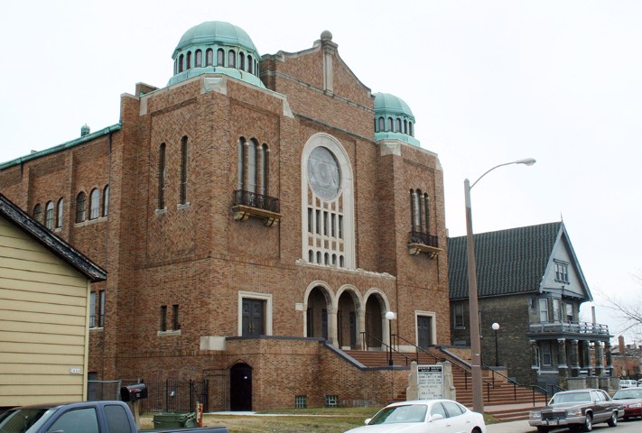 The Greater Galilee Credit Union is run out of the Greater Galilee Missionary Baptist Church in Milwaukee. The building, which housed Congregation Beth Israel Synagogue until 1960, was listed on the National Register of Historic Places in 1992. Photo courtesy of Creative Commons