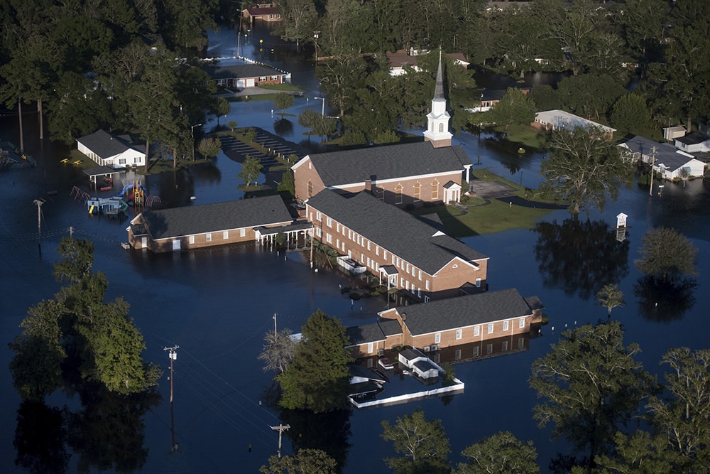 Floodwaters inundate a church after Hurricane Florence struck the East Coast on Sept. 17, 2018, in Conway, S.C. (AP Photo/Sean Rayford)
