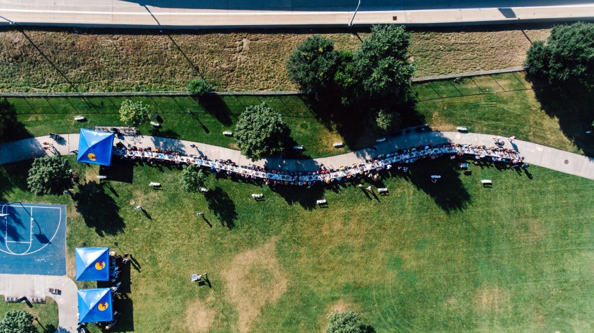 “The HeARTside Community Meal” by Seitu Jones, which featured a long table and meal in a park, won the ArtPrize 2017 Jurors’ Grand Prize. Photo courtesy of ArtPrize