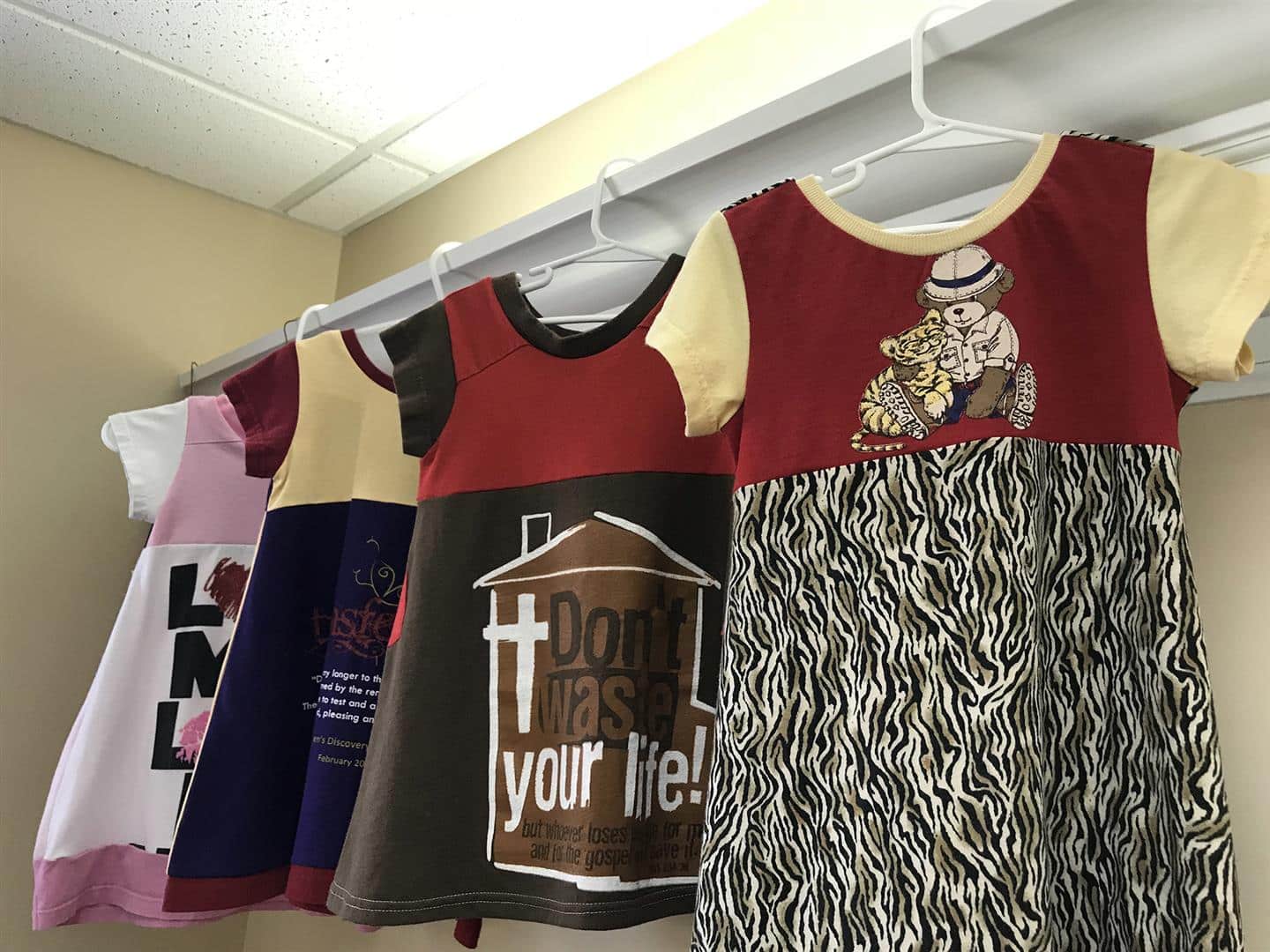 Volunteers with We Sew Love ministry in Birmingham have figured out a way to give new life to old T-shirts. The result is hundreds of unique dresses, boxers, panties, shorts and other articles of clothing that can be easily laundered and re-worn. Photo by Grace Thornton