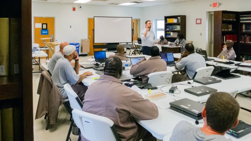 Jamie Dew, dean of the college at Southeastern Baptist Theological Seminary, teaches a theology class to inmates at Nash Correctional Institution in Nashville, N.C. RNS photo by Sam Morris