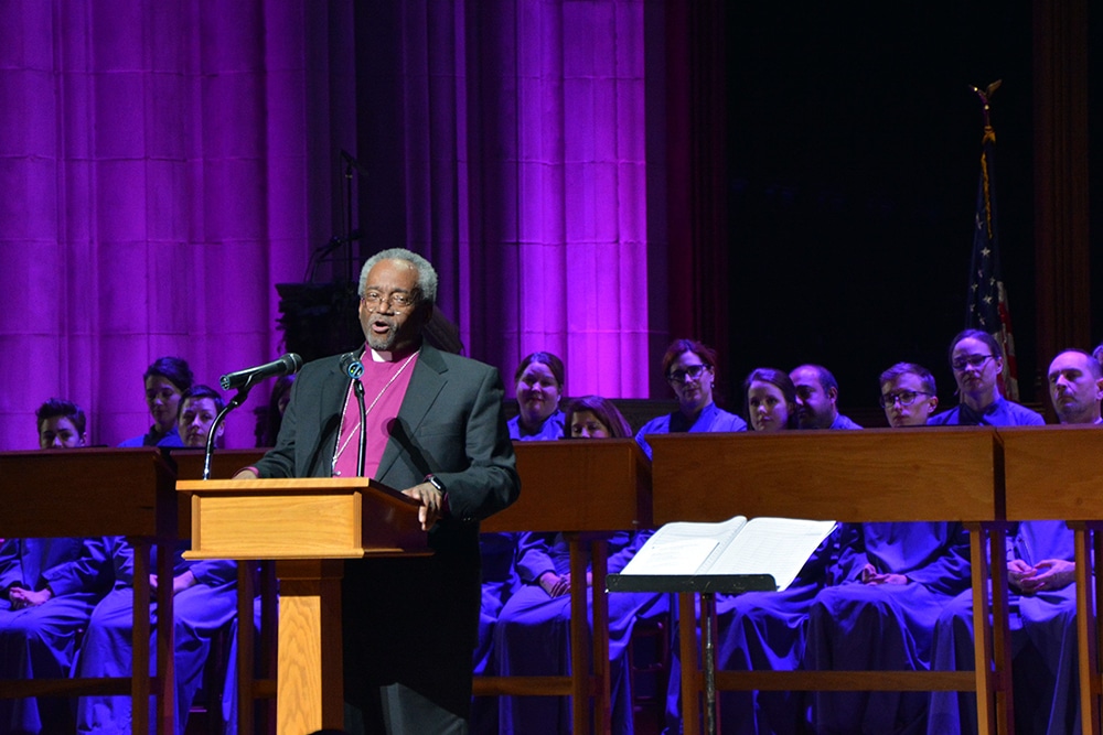 Presiding Bishop of the Episcopal Church Michael Curry addresses the gathering at the Washington National Cathedral on Dec. 11, 2018. RNS photo by Jack Jenkins