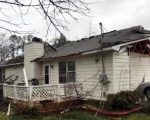 home damaged by tornado
