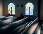 woman in pew