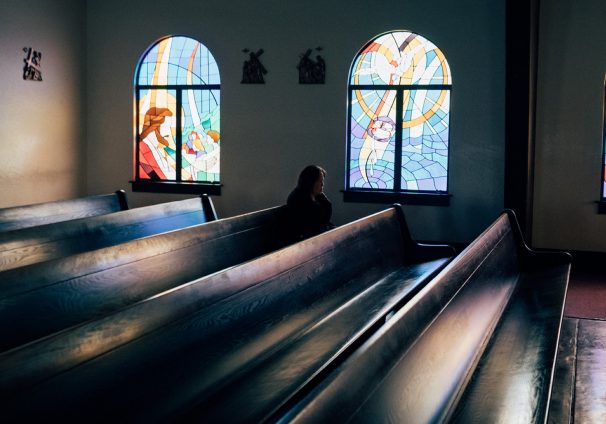 woman in pew