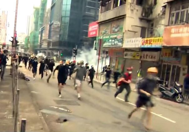 Hong Kong police oppose protesters by force