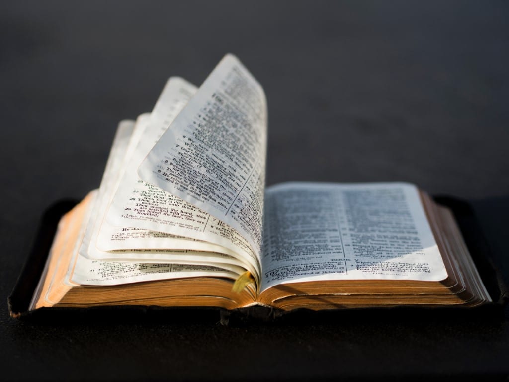 Bible with pages turning