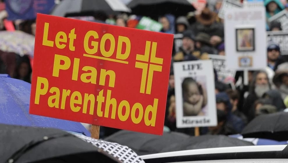 Let GOD Plan Parenthood" sign