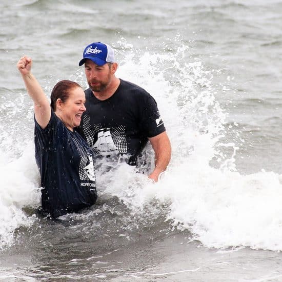 Susie Linnell baptized by pastor Josh Adams