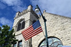 flag and church