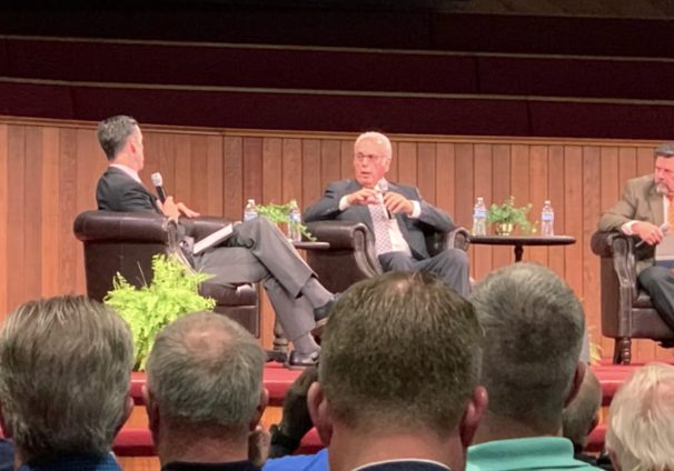 John MacArthur at a panel discussion