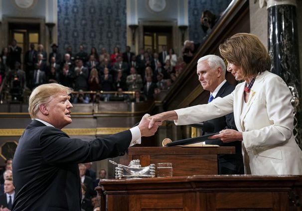 President Donald Trump shakes hands with House Speaker Nancy Pelosi
